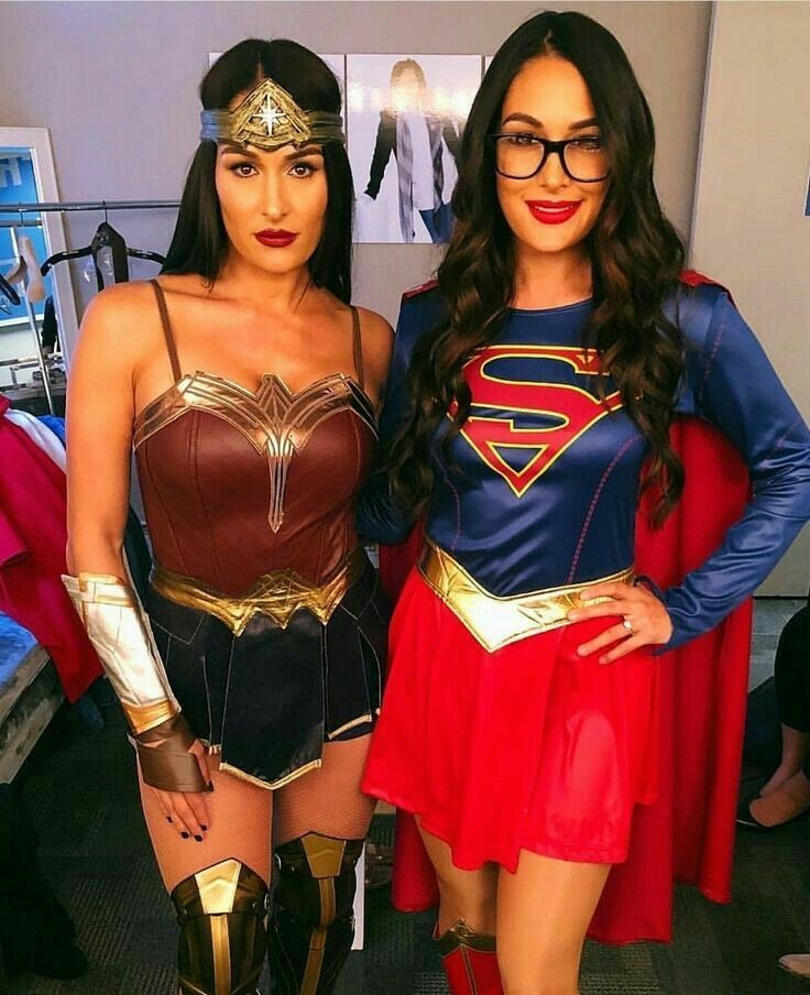 The Bella Twins As Wonder Woman And Superman 0
