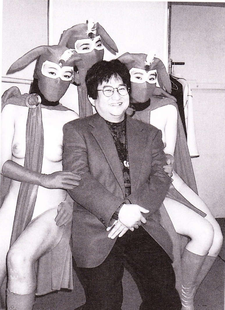 The Creator Of Kekko Kamen Surrounded By Cosplay