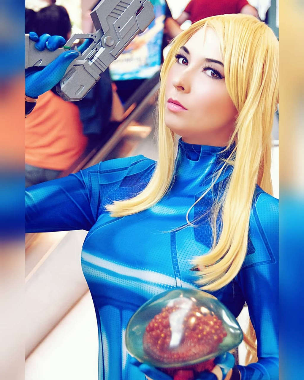 Samus Cosplay With Lil Metroid Sel