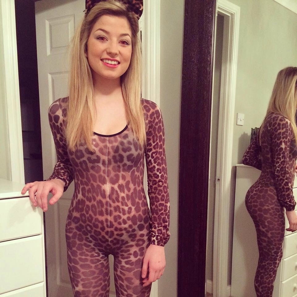 Cutie In A Full Body Leopard Print Catsuit And Ear
