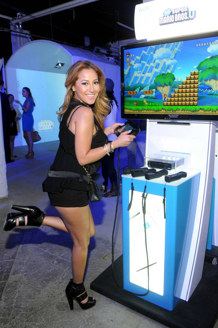Adrienne Bailon Playing With A Wii U From Celebrit